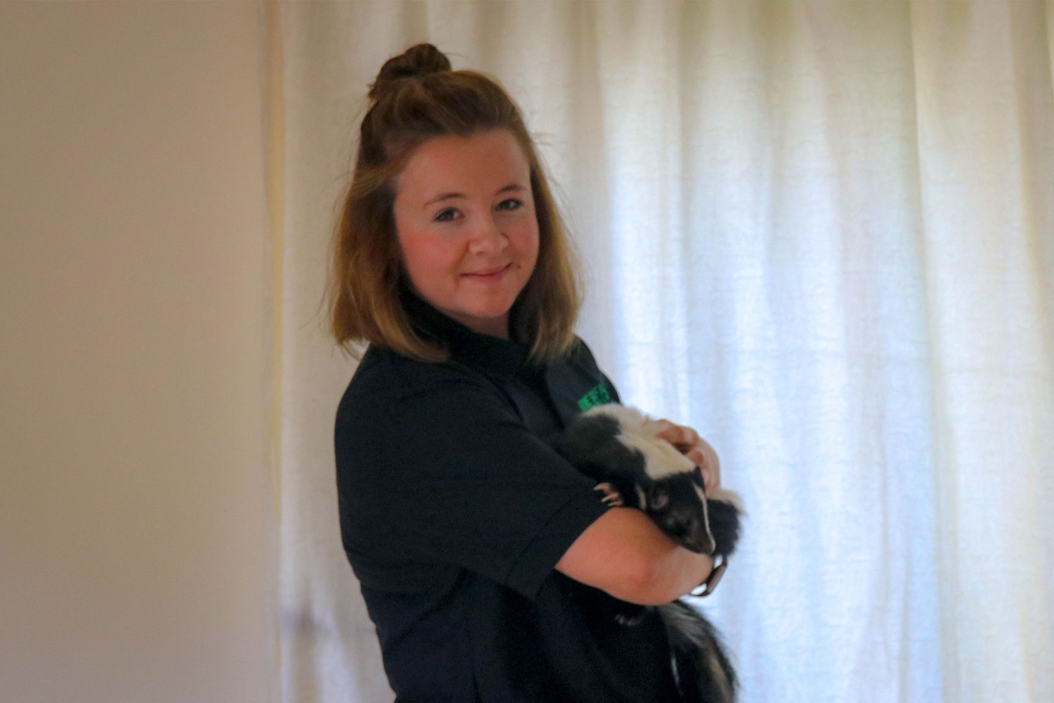 Amanda holding one of our skunks